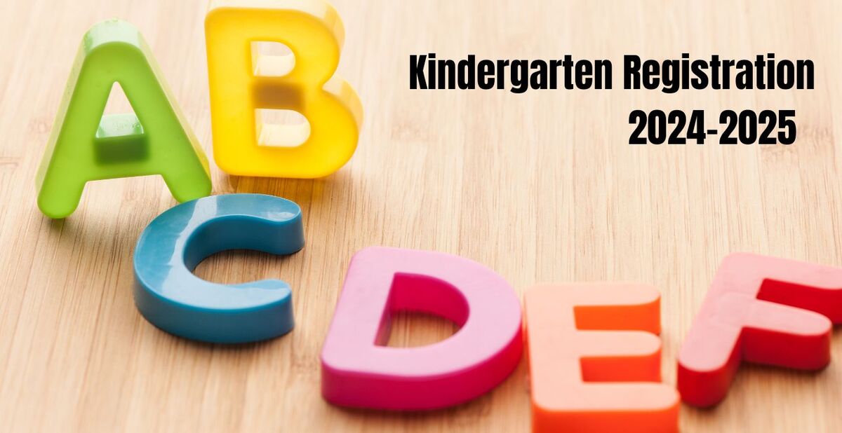Kindergarten Registration banner and magnet letters on table